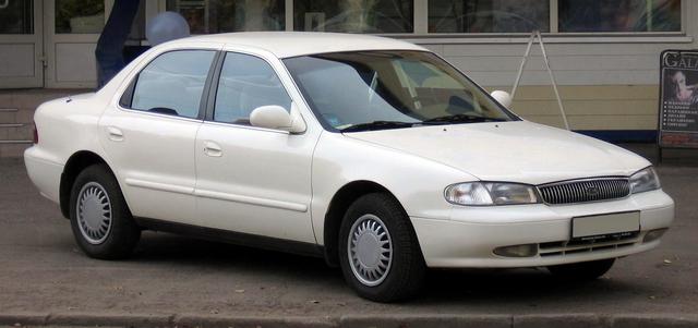 ,    Kia Clarus II 1996 -
                